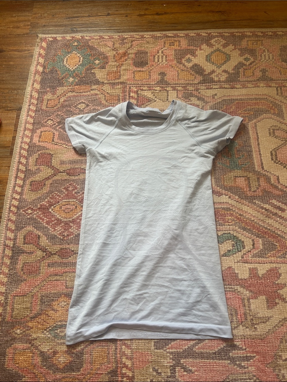 very light purple lululemon shirt